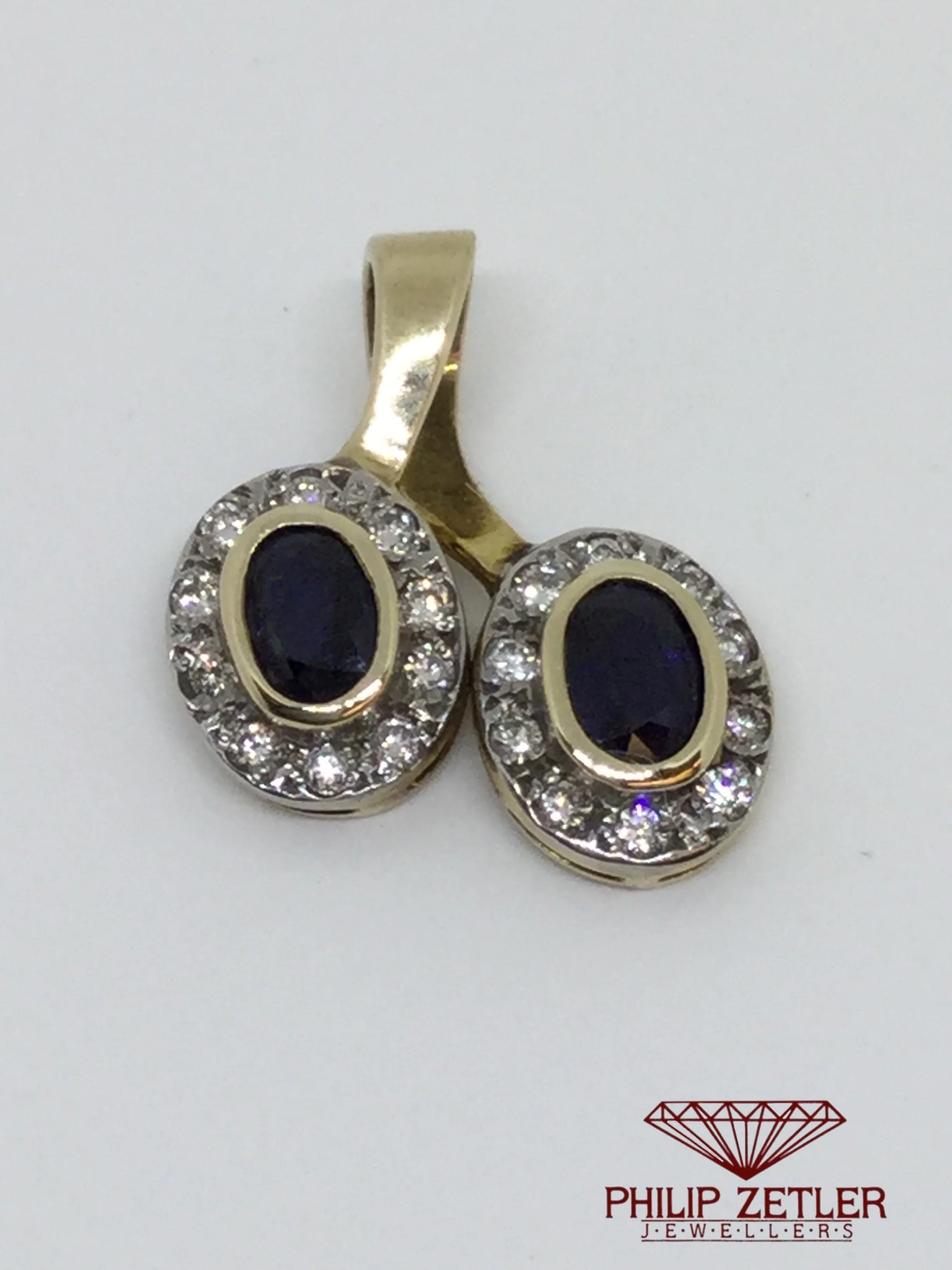 18 ct Twin Oval Sapphire &  Diamond Pendant