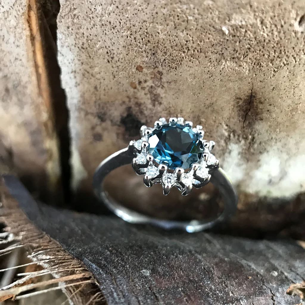 Romantic London Blue Topaz and  Diamond Halo Ring
