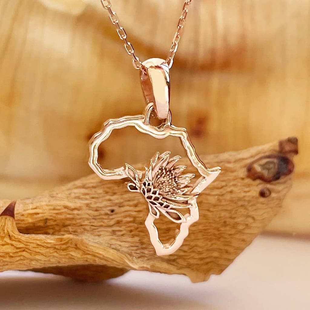 Petite Map of Africa Protea Pendant In Rose Gold